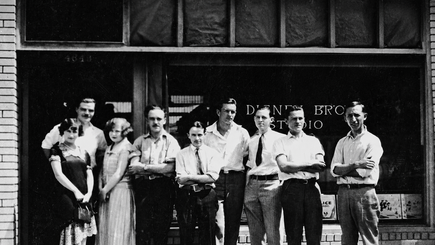 Disney Brothers Cartoon Studio staff outside 4651 Kingswell Avenue, mid-1920s.