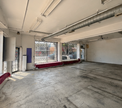 Interior of the ±2,500 SF retail shell, looking toward the corner storefront.